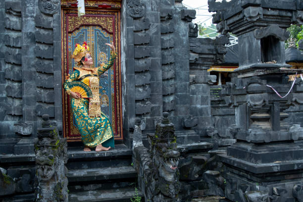 istock Balinese dancer posing in the temple 1373080785