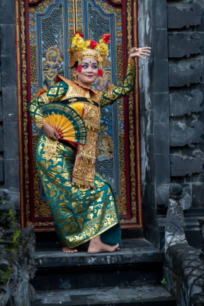 istock Balinese dancer posing in the temple 1373080876