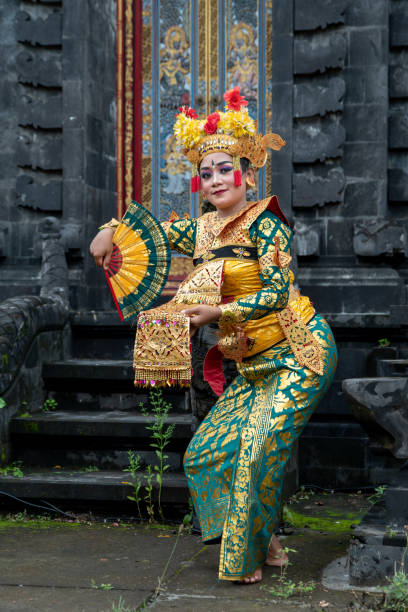 istock Balinese dancer posing in the temple 1373080877