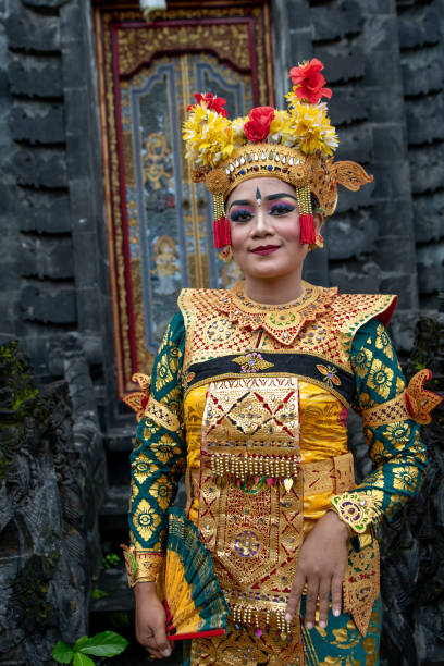 istock Balinese dancer posing in the temple 1373081708