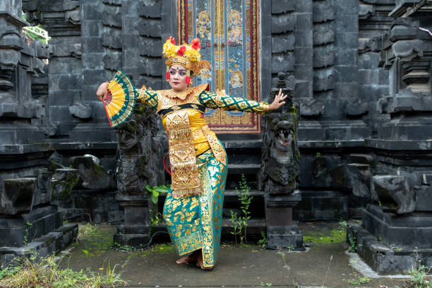 istock Balinese dancer posing in the temple 1373081746