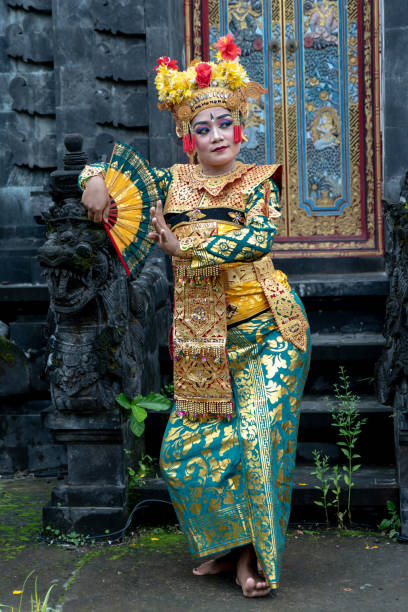 istock Balinese dancer posing in the temple 1373081773