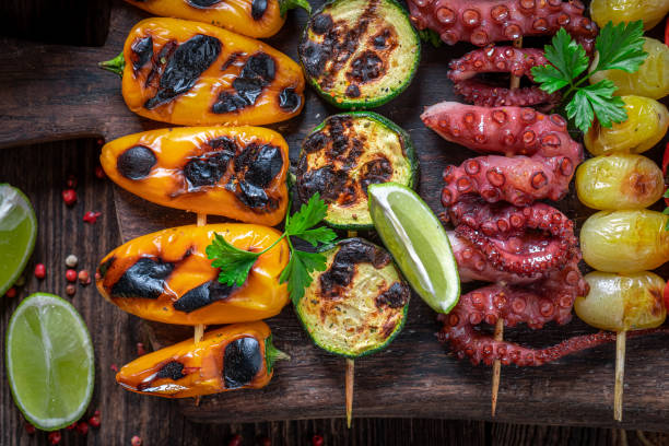 istock Grilled skewer with vegetables and fresh seafood. 1373081849