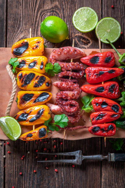 istock Hot roasted skewer with peppers, tomatoes and zucchini. 1373081936