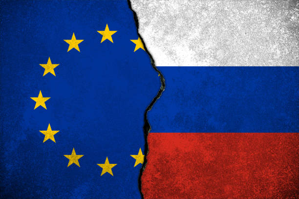 istock European union and russian flags painted on concrete wall background 1373083020