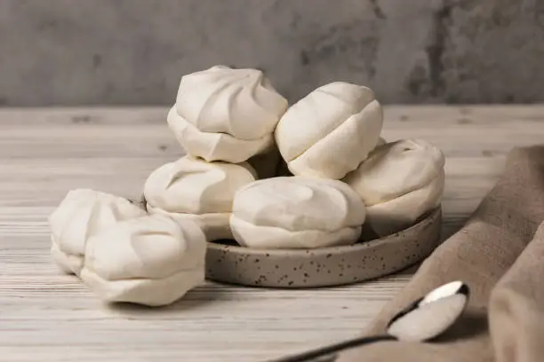 sweet white marshmallow on light background