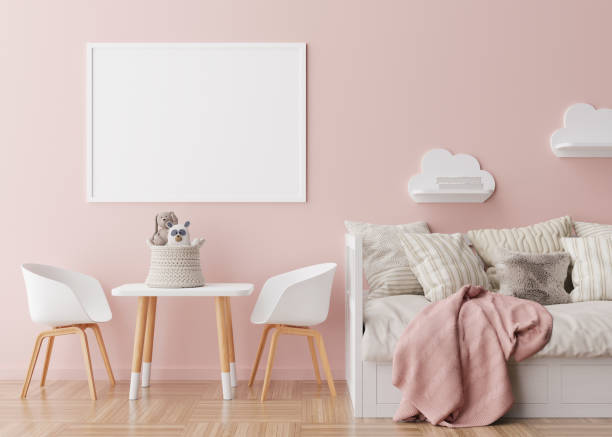 istock Empty horizontal picture frame on pink wall in modern child room. Mock up interior in scandinavian style. Free, copy space for your picture. Bed, table, chairs, toys. Cozy room for kids. 3D rendering. 1373084749