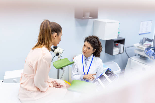 gynecologist doctor and a patient on a gynecological chair. Preventive reception, preparation for medical examination, pregnancy management, health care gynecology contol gynecologist doctor and a patient on a gynecological chair. Preventive reception, preparation for medical examination, pregnancy management, health care gynecology contol gynaecologist stock pictures, royalty-free photos & images