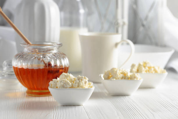 istock Fresh homemade cottage cheese with honey. 1373089100