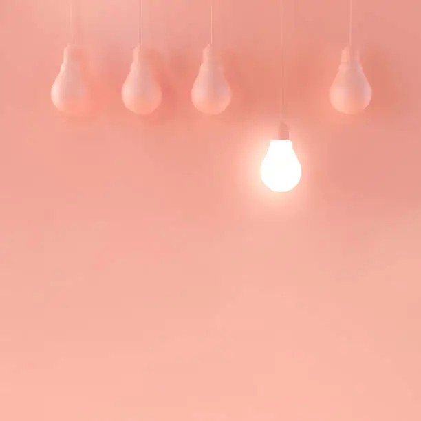 Hanging light bulbs on colorful pink background. 3D illustration.