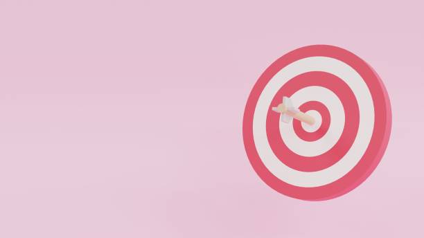 istock Target with arrow. Pink background with copy space 1373095022