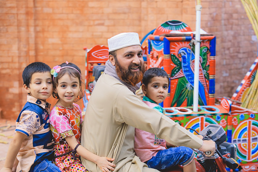 Peshawar, Pakistan - July 21, 2021: Local People on the Peshawar City Center Crowded Streets