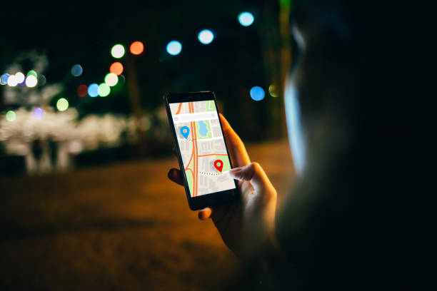 istock Woman planning route to destination point using online map 1373103265