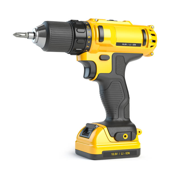 Yellow electric screwdriver drill  isolated on white. stock photo