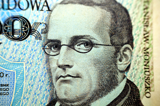 Portrait of Stanisław Moniuszko, old Polish Zloty money, Poland, vintage retro, selective focus of fragment of obverse side of 100000 one hundred thousand old Polish Zlotych banknote year 1993