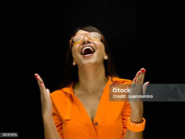 Cheerful Hispanic Young Woman Stock Photo - Download Image Now - Portrait, Humor, Black Background