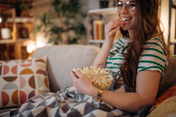 istock Woman watching TV 1373118416