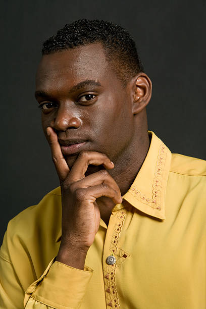 istock Dark man in yellow shirt 137312192