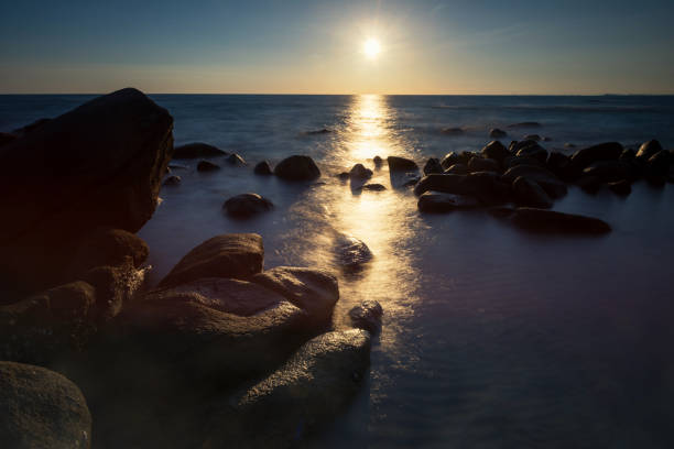 istock Motion seascape hit stone arch at sunset, Rayong 1373122548