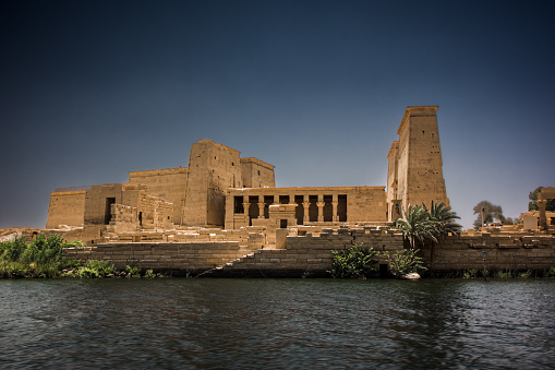 An Isis statue in the Temple of Isis which is part of the religion of ancient Egyptian civilization.