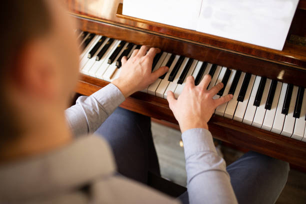 istock Playing piano on morning sun 1373124747