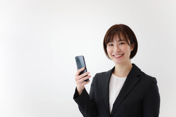 istock Woman with a smartphone 1373126752