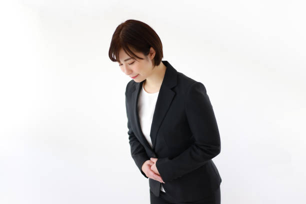 istock Female employee bowing 1373126771