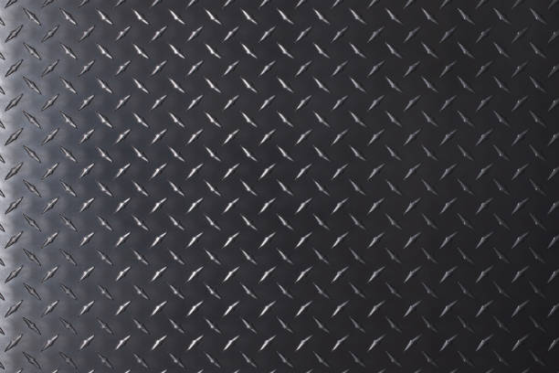istock dark metal texture with diamond pattern, steel background 1373128438