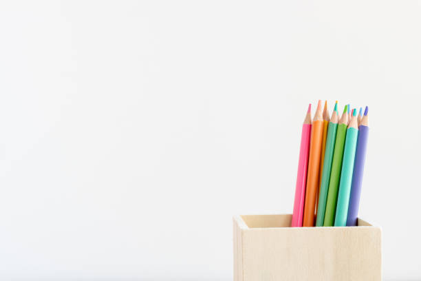 istock Several pastel colored pencils in wooden holder close-up 1373128452