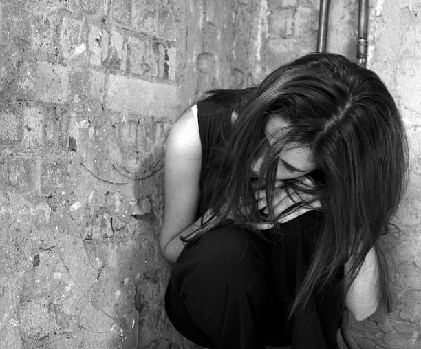 istock Woman hiding her face in gray picture 137312885