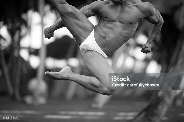 Airborne Athlete Jumps Stock Photo - Download Image Now - Judo, 20-29 Years, Abdominal Muscle