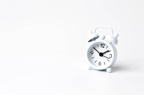 istock White alarm clock isolated on a white background 1373131505