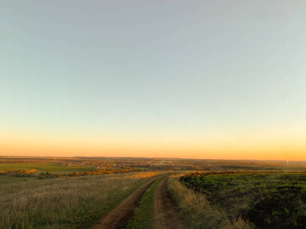 istock Rural road on sunny day. 1373131622