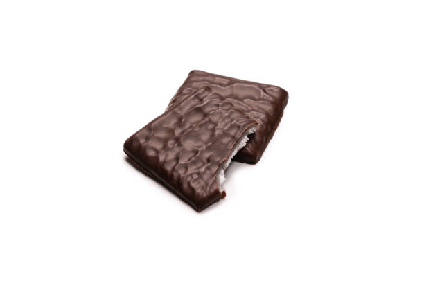 istock Dark chocolate candies isolated on white background. 1373133378