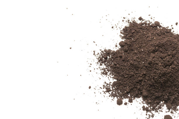 istock Black land for plant isolated on white background. 1373133381