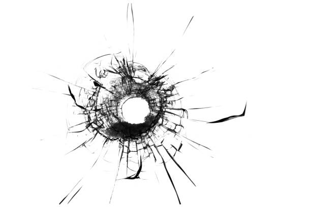 istock The texture of broken glass. Bullet hole 1373134848