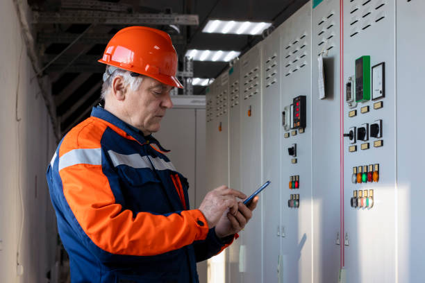 istock An electrical engineer inspects the control panels controlling the electrical system in the control room. 1373135935