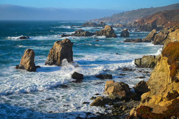 istock Waves Crashing Along The Rugged Big Sur Coastline 1373137383