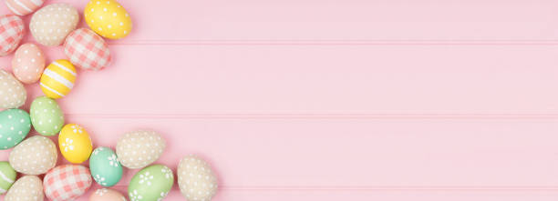istock Easter corner border with rustic cloth and pastel colored eggs over a pink wood banner background 1373138090