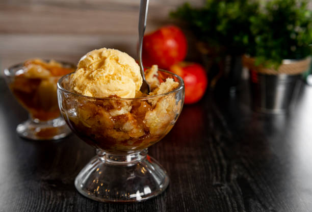 istock Bowl of apple cobbler with ice cream 1373138491