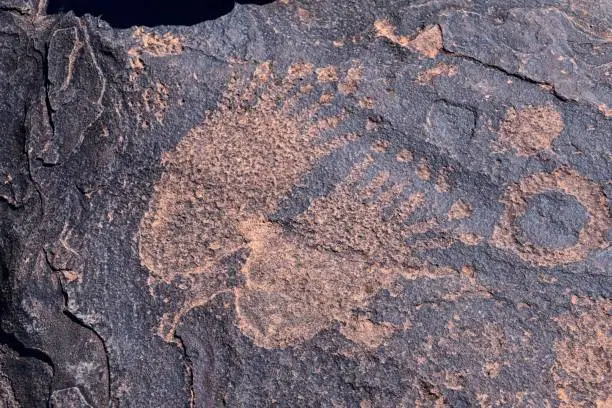 Photo of Petroglyphs Rock Paintings St George Utah on Land Hill from Ancestral Puebloan and Southern Paiute Native Americans thousands of years old on Sandstone. USA.