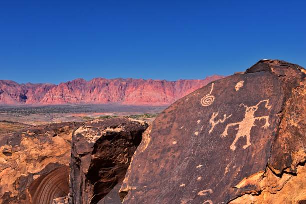 Petroglyphs Rock Paintings St George Utah on Land Hill from Ancestral Puebloan and Southern Paiute Native Americans thousands of years old on Sandstone. USA. stock photo