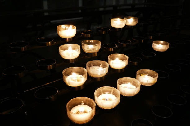 istock Prayer candles in a church 1373147404