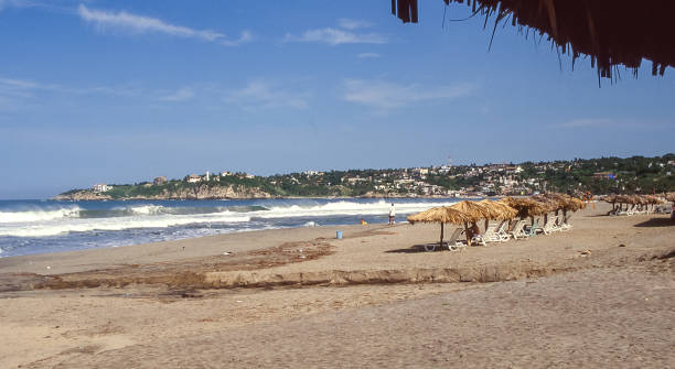 View of the beach of Puerto Escondido, a popular seaside resort among globetrotters and surfers from all over the world.