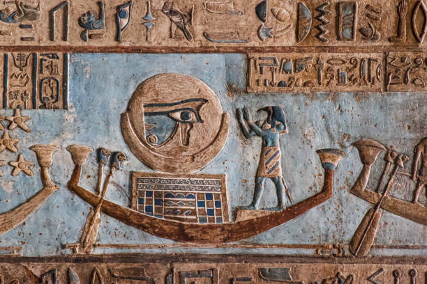 Egyptian hierogryphs from Dendara Temple, Egypt Egyptian hierogryphs from Dendara Temple, Egypt, displaying the eye of Horus and egyptian god in a boat horus stock pictures, royalty-free photos & images