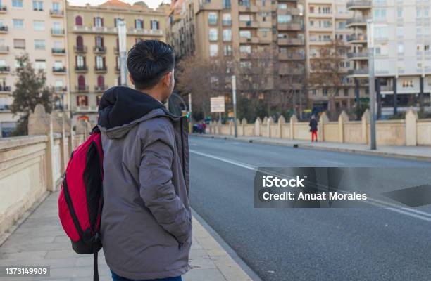 Back View Of A Mexican Exchange Student Standing On A Bridge Stock Photo - Download Image Now