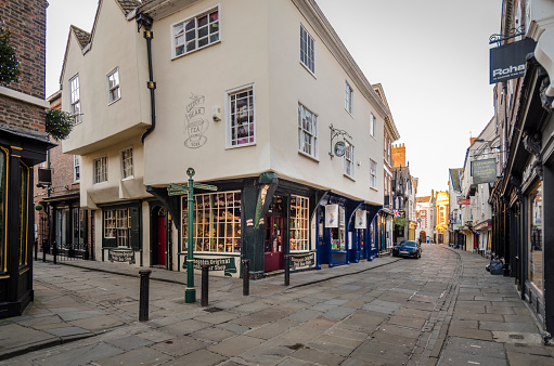 YORK,UK - NOVEMBER 09, 2012: Stonegate and Teddy bear shop and tea rooms at dawn in York, UK
