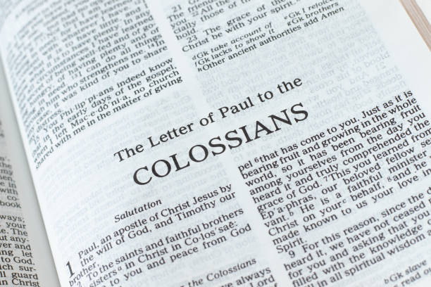 Colossians open Holy Bible Book close-up stock photo