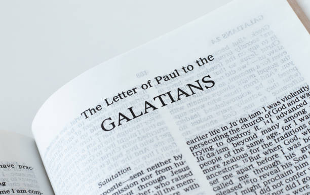 istock Galatians open Holy Bible Book isolated on white background 1373150645
