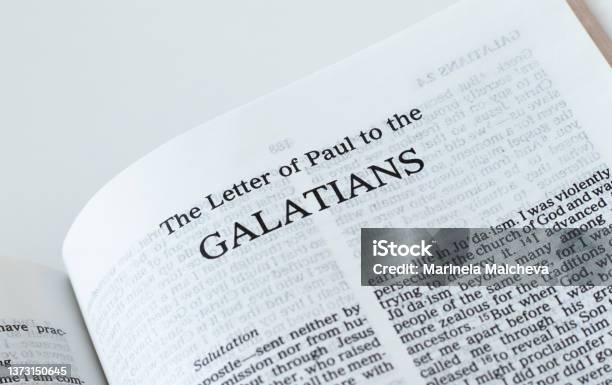 Galatians Open Holy Bible Book Isolated On White Background Stock Photo - Download Image Now